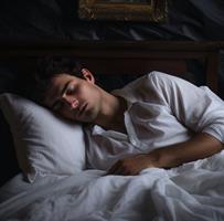 man-sleeping-on-pillow