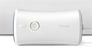 A Nitetronic Goodnite Anti-Snore Pillow on a bed