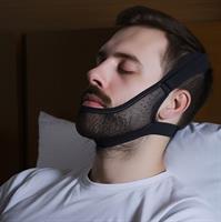 man-in-bed-with-chin-strap