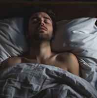  man-in-bed-shirtless-sleeping 